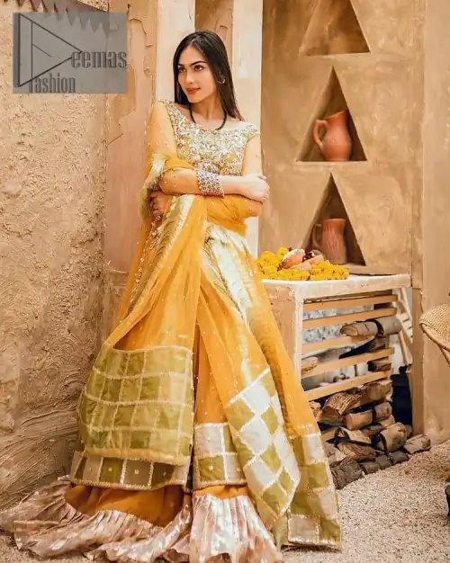 Mustard is just associated and boosts your Mehandi. Presenting a dreamy mustard frock with a heavily embroidered bodice on a