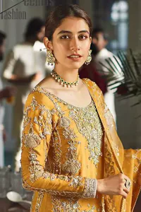 DeemasFashion introduces a Mustard short shirt and Sharara as Mehndi wear. A Short shirt featuring a stunning front, full sleeves, and remarkable embroidery on a round neckline, initiates the attractiveness of this dress. Mustard Short Shirt Sharara as Bridal Mehndi Wear.
