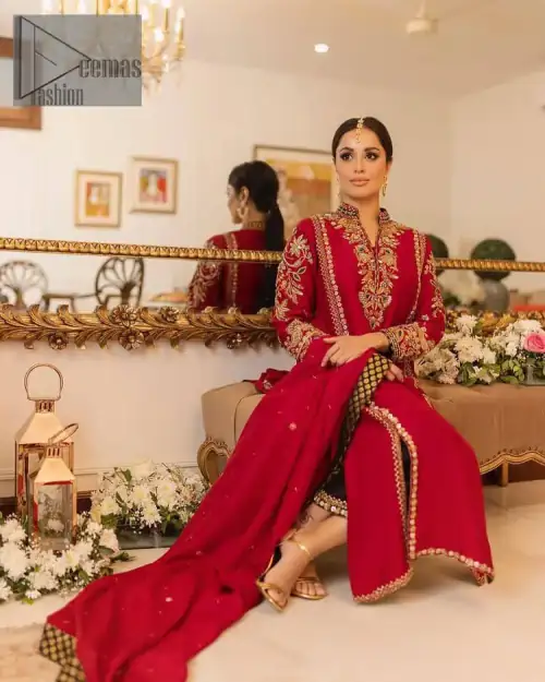 The forever favourite red dress channelling your inner diva. A luxury red long shirt rendered with intimate embroidery in golden