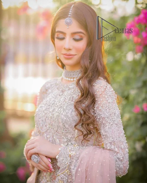 Introducing the mauve nikah outfit which begins with a short shirt that is meticulously and laboriously hand-rendered with silver embroidery