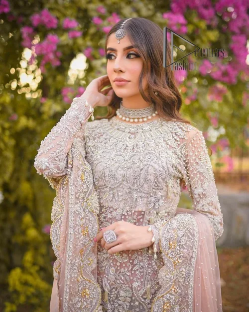 Introducing the mauve nikah outfit which begins with a short shirt that is meticulously and laboriously hand-rendered with silver embroidery