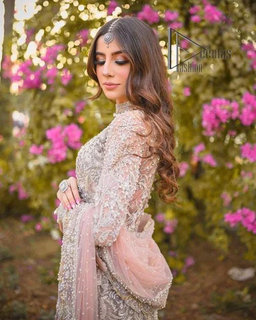 Introducing the mauve nikah outfit which begins with a short shirt that is meticulously and laboriously hand-rendered with silver embroidery