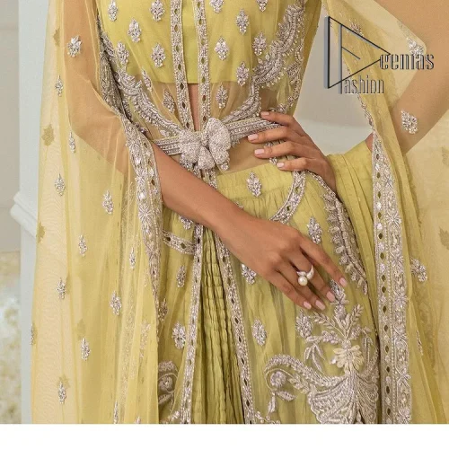 The love we share will make her mehndi day super duper amazing. This mehndi wears an olive front open shirt