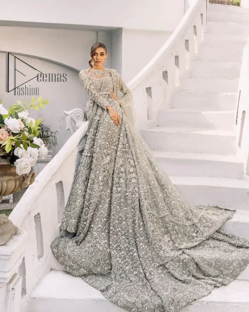 It was love at first swipe! Presenting this olive green back train maxi which is laboriously hand-rendered with silver and