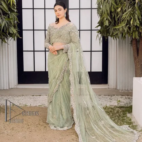 You go girl. Get you a handsome outfit that will wear matching robes. DeemasFashion presents this pistachio green saree to