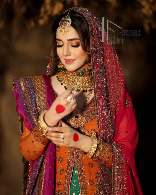 A colourful mehndi outfit is a power which directly influences the soul. Begin this mehndi outfit with a rusted front