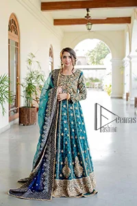 The bride wears blue just touches the blues of the sky. DeemasFashion introduces this teal blue mehndi outfit which begins with panelled Anarkali. The following Anarkali is exquisitely hand-rendered with a light golden embroidery which involves tilla, dabka, kora and zardozi. The floral motifs are also embellished on panels to make this Anarkali priceless. Furthermore, the round shape neckline and full sleeves also enhance the beauty of this mehndi outfit. It is handsomely and attractively paired up with brocade lehenga which gives a unique pieace of charmless.