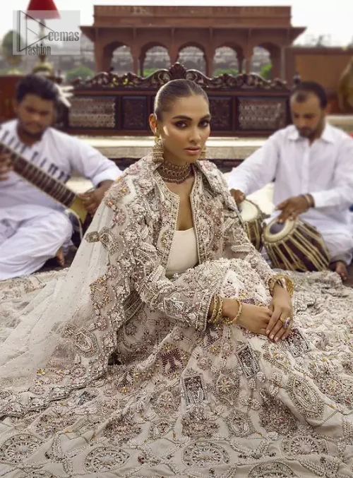 This vibrant canvas is all your brides need to cheer in at your special Nikah moments. A beige white blouse