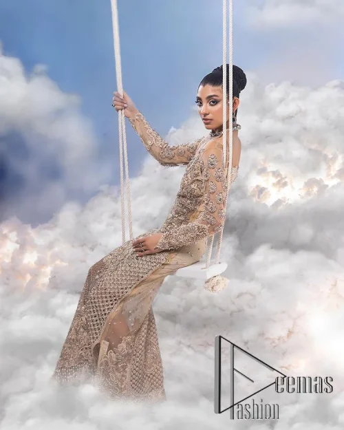 It was love at first swipe. A light fawn heavily hand-crafted maxi for an elegant daytime Nikah look. This light