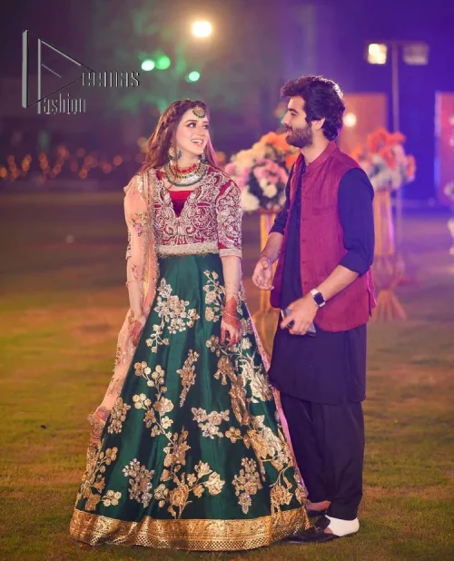 A combination of red and green are here to win hearts at your Mehndi. The attractive lehenga in green colour
