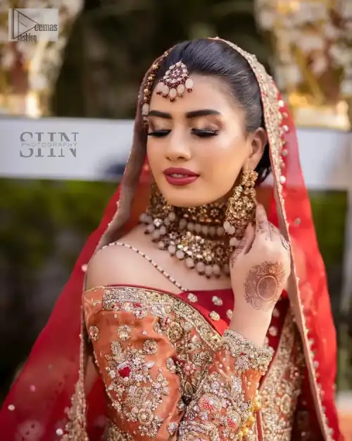 Shine bright in the sparkling ensemble from DeemasFashion. Introducing this reception outfit which begins with a rust pishwas.  This front