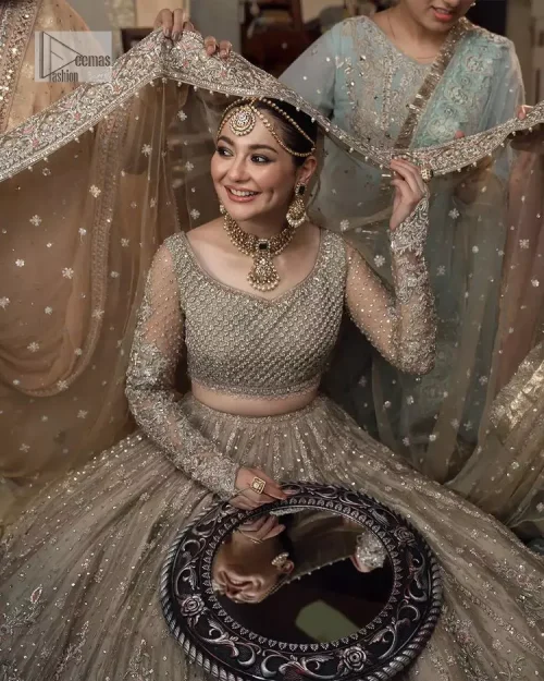 Regal and Charismatic - This is all the outfit is about! A desirable beige lehenga and choli are entirely heavily