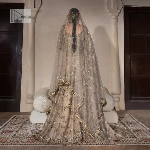 Unravel your inner density with our ivory nikah outfit. DeemasFashion presents this outfit which is embellished with light golden embroidery