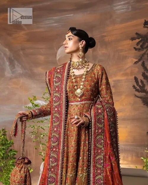 Blissful rust! This ensemble is the epitome of grace. DeemasFashion presents this beautiful mehndi outfit in rust colour to make
