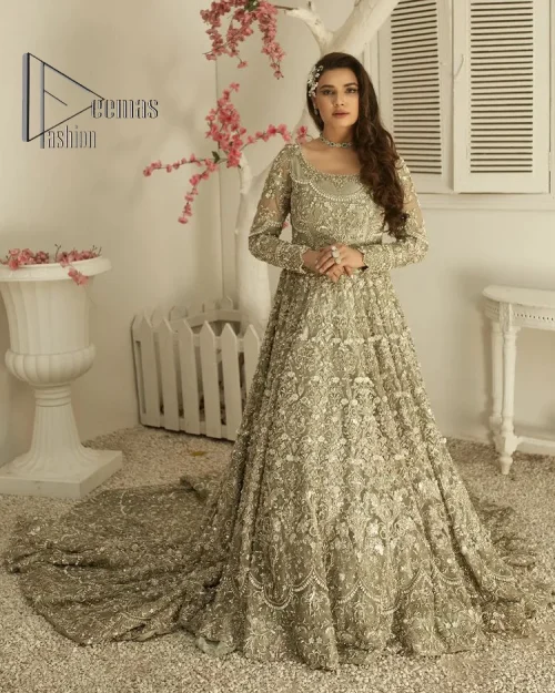 It was love at first swipe! Present this olive green back train maxi which is laboriously hand-rendered with silver embroidery