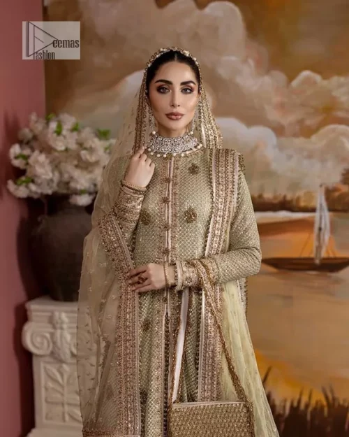 It's where words are not necessary – the outfit does all the talking! A beautiful designed pale green long shirt