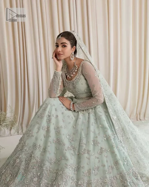 Exquisitely designed ensembles with delicate embroideries & traditional embellishments for nikah outfit statements. This beautiful maxi that comes in aqua