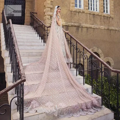 The subtle colour palette, delicate embroidery and eye-catching details. All in all a true style statement! Presenting this fawn maxi