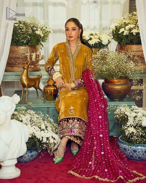 This mustard ensemble features zari and tilla details creating the perfect magical look for the season! The stunning long shirt