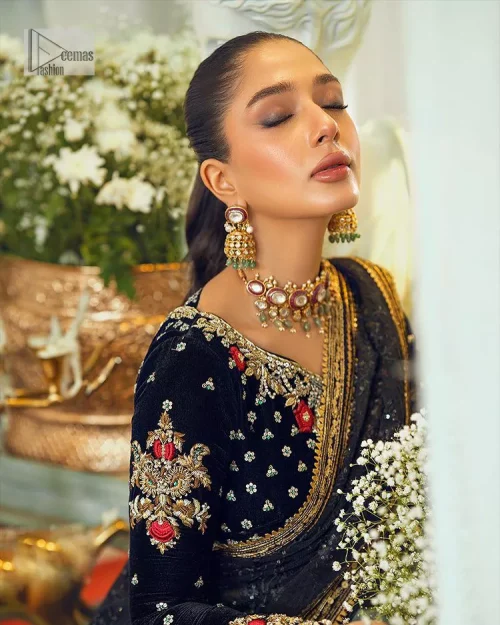 Black, is a reminder to love yourself. The navy blue blouse is augmented with elusive dabka and remarkable naqshi to