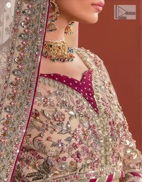 This elegantly poised nikah wear defines trendy fashion in its most acceptable form! The lehenga blouse is in the peach