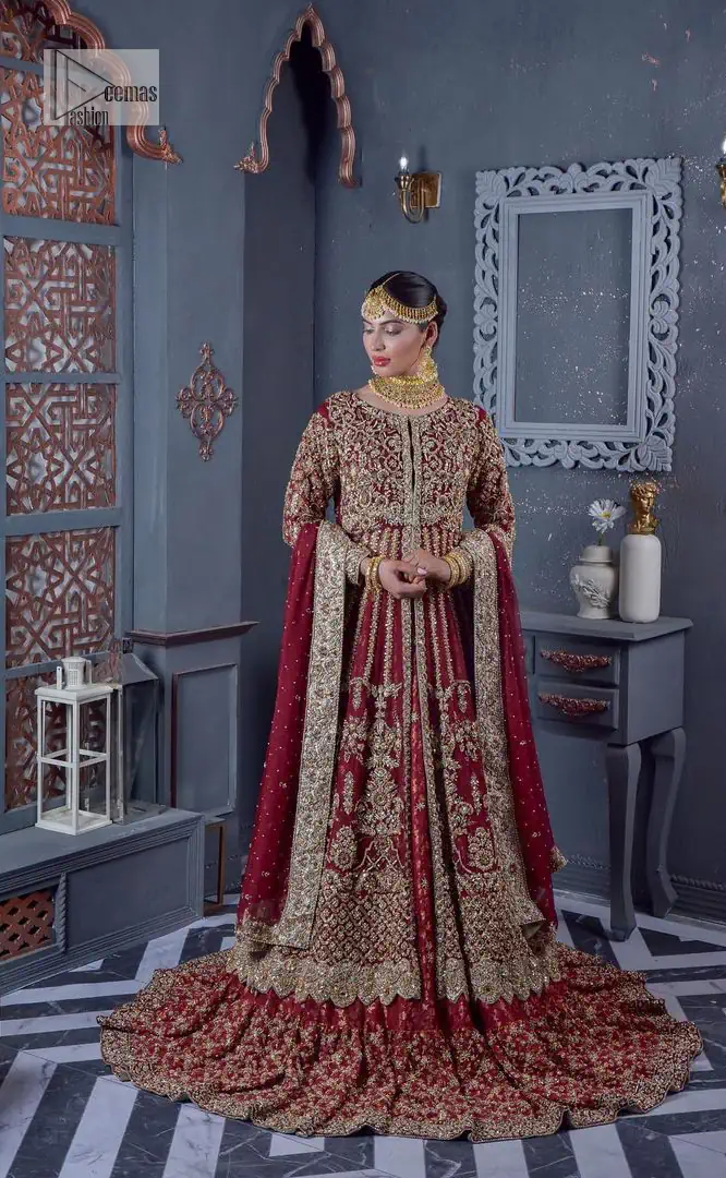Bold and classy colour for the reception outfit! The maroon gown is breathtakingly adorned with hand-crafted embellishments and intricate designs.