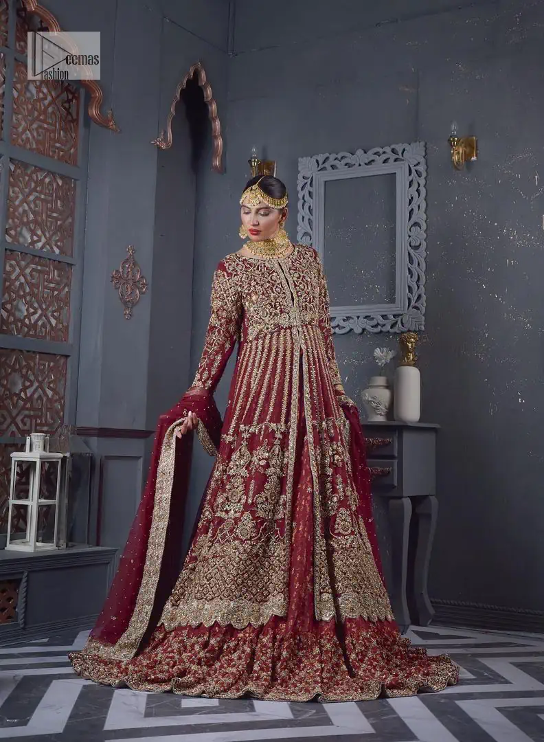 Bold and classy colour for the reception outfit! The maroon gown is breathtakingly adorned with hand-crafted embellishments and intricate designs.