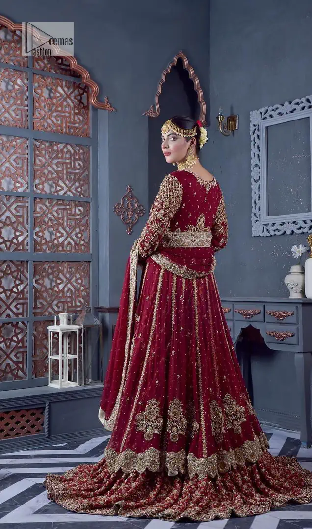 Bold and classy colour for the reception outfit! The maroon gown is breathtakingly adorned with hand-crafted embellishments and intricate designs.