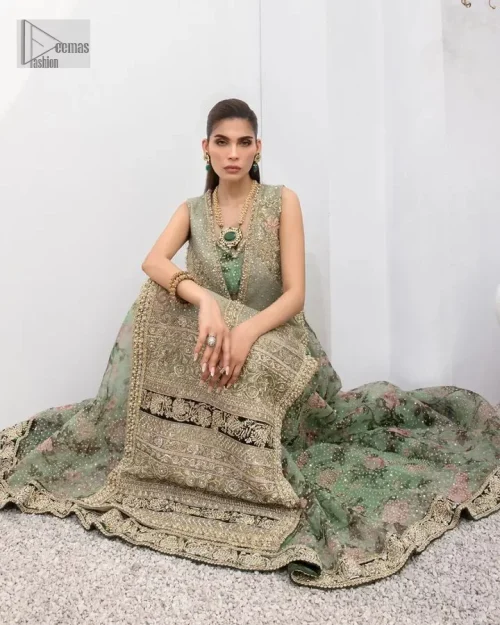 The timelessly classic mint green nikah outfit! The beautiful model looks ravishing in this mint green shirt, heavily hand-embellished with