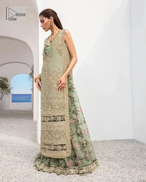 The timelessly classic mint green nikah outfit! The beautiful model looks ravishing in this mint green shirt, heavily hand-embellished with