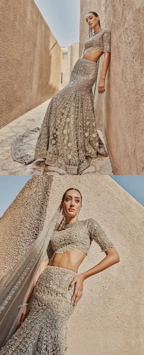 This fusion of floral embroidery is total fashion goodness for a walima outfit! A stunning teal grey organza choli embellished