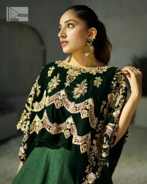 Style. Warmth. Performance & versatility! This stuns in a beautifully handcrafted green top enshrined with light golden embellishment and detailed