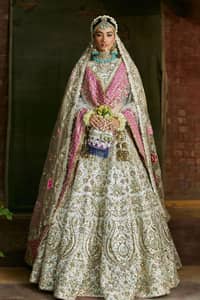 Make your Nikah a truly memorable occasion with our exquisitely tailored outfit, designed to enhance your natural beauty and captivate all in attendance.  The dress comes with a single dupatta. It has a mixture of machine and hand embroidery but we will only do hand embroidery.