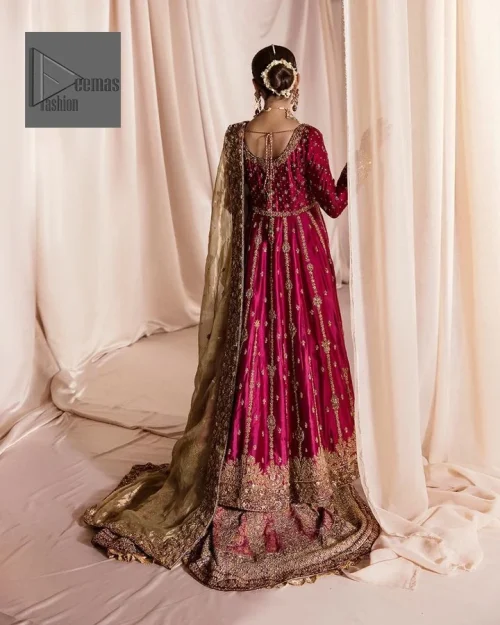 Be a dreamy vision in this reception wear. The beautiful frock in the shocking pink shade is embellished with intricate