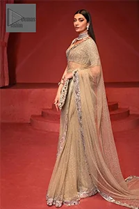 Further, it comes with a half-sleeved style to give a royal touch. Its round neckline is just the epitome of grace.