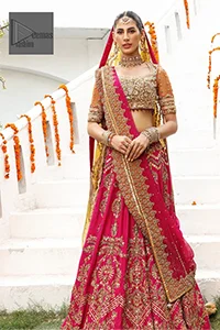 Complete this outfit with a dupatta in a shocking pink color enveloped with a four-sided adorned border and spray of sequins all over to make it truly regal and royal.