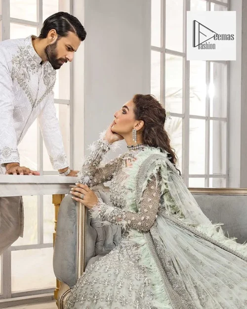 The lehenga is also embellished with beautiful zari work. Complete this article with a dupatta framed with four-sided embellished borders