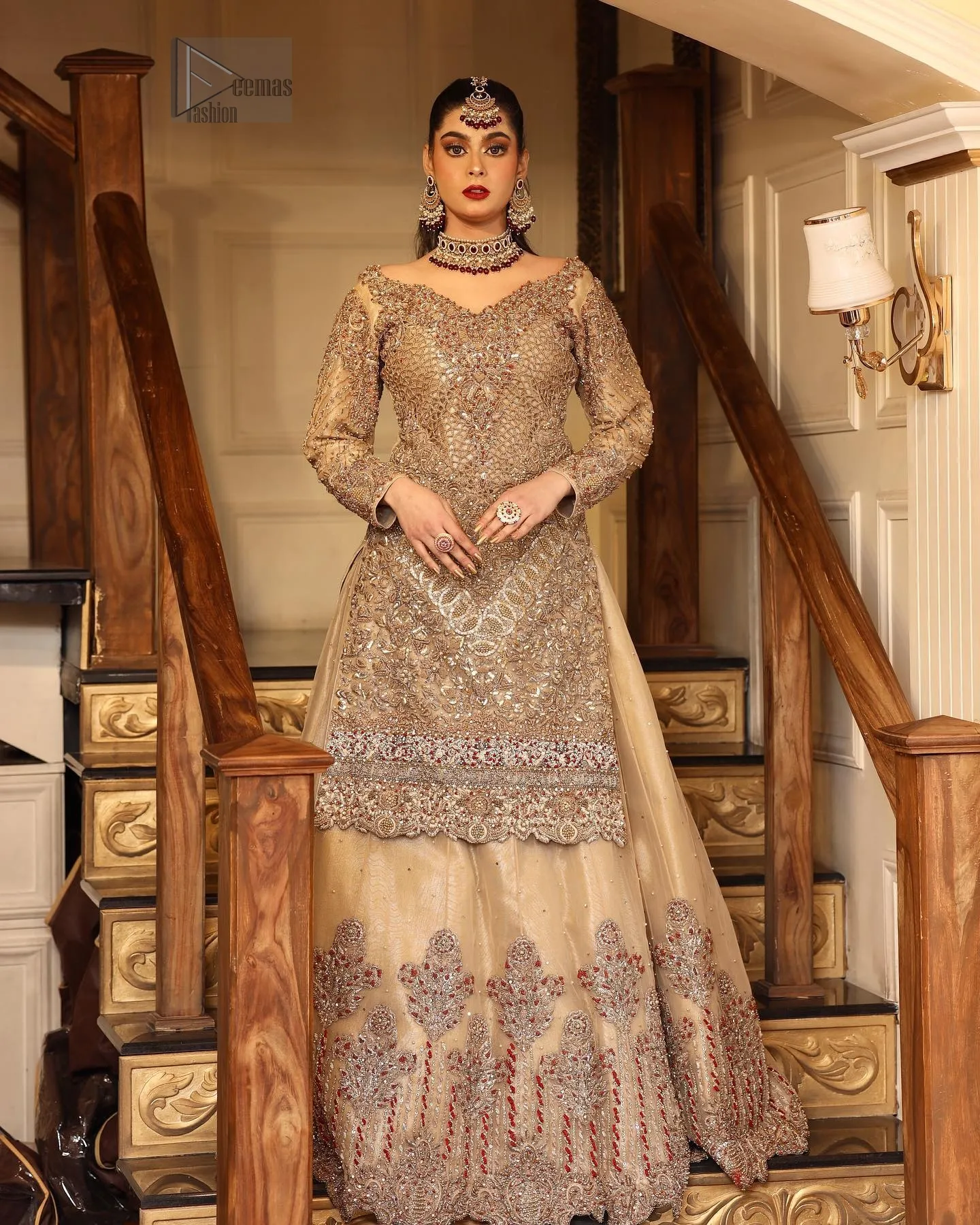 The scalloped hemline adds a playful, romantic touch, while the organza fabric enhances the overall ethereal feel of the outfit. This timeless creation effortlessly blends traditional charm with modern sophistication, making you feel like the essence of bridal elegance.