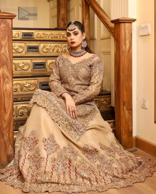 The can-can lehenga adds volume and movement, creating a dreamy effect as you glide across the room. The scalloped hemline