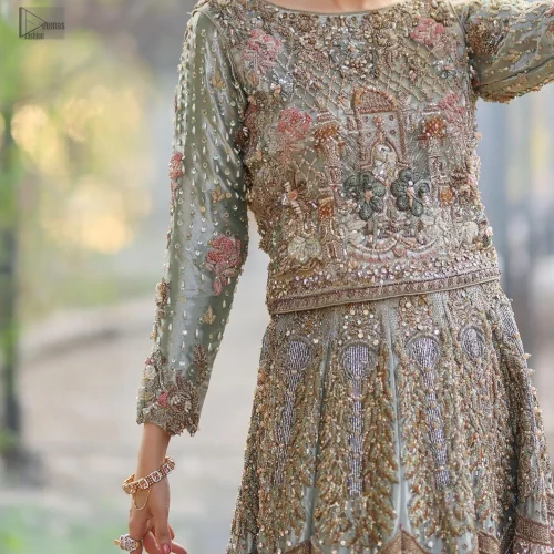 This stunning ensemble features a refreshing mint hue embellished with minutely detailed multiple-colour thread embroidery that brings the outfit to