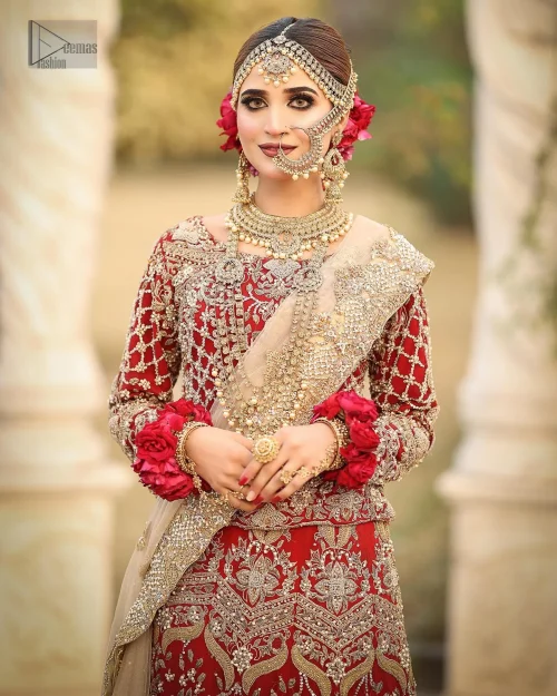 Not to forget, the graceful neckline and full sleeves offer timeless elegance.