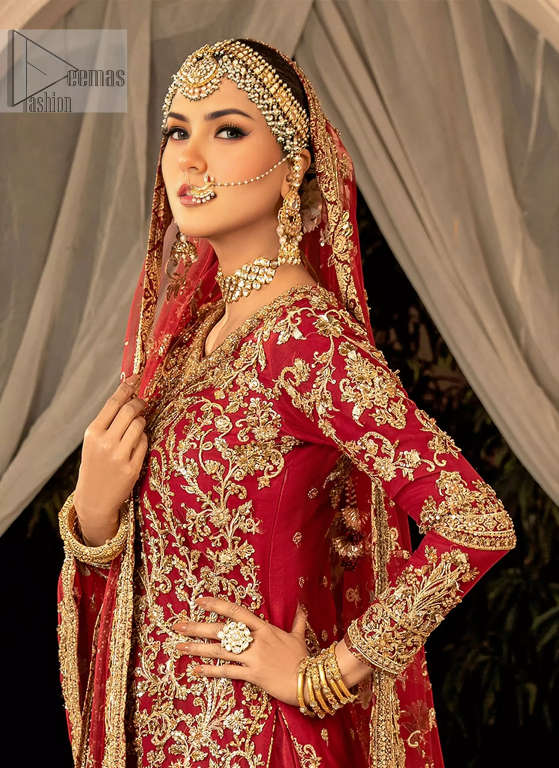 Step into your wedding day with the Red Long Shirt Back Train Farshi Lehenga, a stunning combination of traditional charm and modern grace.