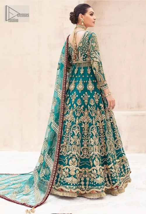 The embellished bodice glitters under the light, while the delicate chatta patti on the hem adds artistry. The lehenga's voluminous