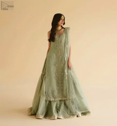 Round neckline and light golden hand embroidery on sage katan organza shirt.