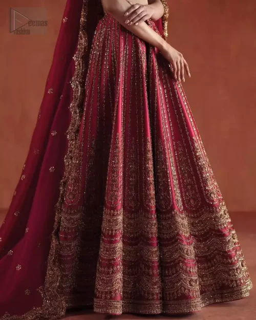 Side Profile Silhouette: Side view of the crimson blouse and lehenga, emphasizing the elegant fit-and-flare bridal silhouette.