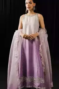 Lavender silk shirt and trousers set with subtle dabka, sequins, pearls, and Swarovski crystal embellishments.