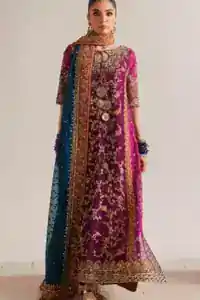 Dabka, pearls, stones, and Swarovski crystals on magenta designer outfit.
